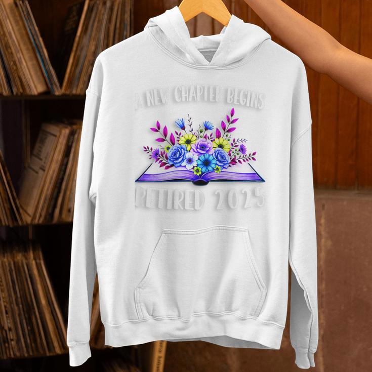 A New Chapter Begins Retired 2025 Floral Book Retirement Unisex Hoodie