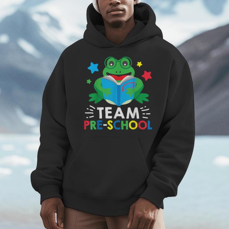 Team Pre-School Reading Frog Back To School Book Lover Men Hoodie
