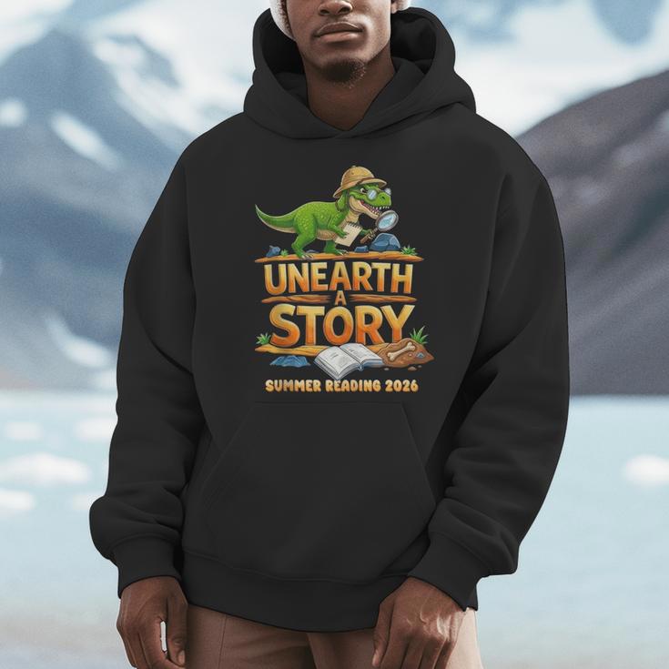 Unearth a Story Dinosaur Reading Books Summer 2026 Men Hoodie Unearth a Story Dinosaur Reading Books Summer 2026 Men Hoodie