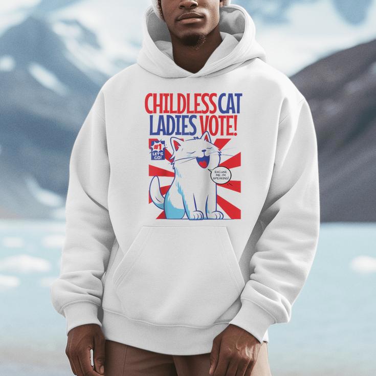 Childless Cat Ladies Vote Kamala Harris Cute Comic Book Cat Raglan Baseball Tee Men Hoodie Childless Cat Ladies Vote Kamala Harris Cute Comic Book Cat Raglan Baseball Tee Men Hoodie
