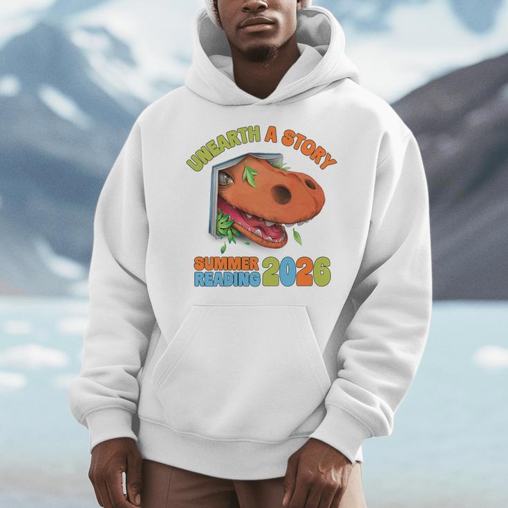 Unearth A Story Summer Reading 2026 Dinosaur Book Lover Dino Premium Tri-Blend Men Hoodie Unearth A Story Summer Reading 2026 Dinosaur Book Lover Dino Premium Tri-Blend Men Hoodie