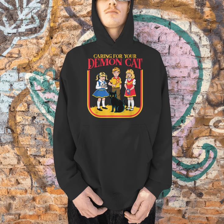 Caring For Your Evil Cat Retro Dark Humor Book Cover Men Hoodie Caring For Your Evil Cat Retro Dark Humor Book Cover Men Hoodie