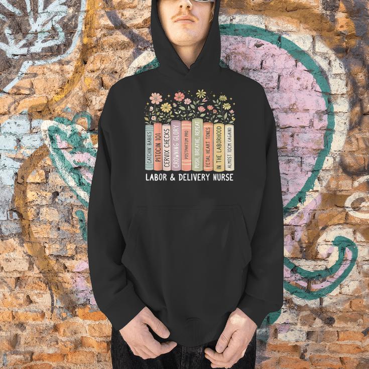 Labor And Delivery Nurse Book Wildflower Mother Baby Nursing Men Hoodie Labor And Delivery Nurse Book Wildflower Mother Baby Nursing Men Hoodie
