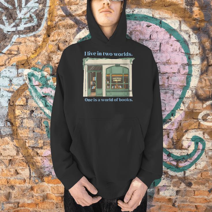 I Live In Two Worlds One Is A World Of Books Men Hoodie
