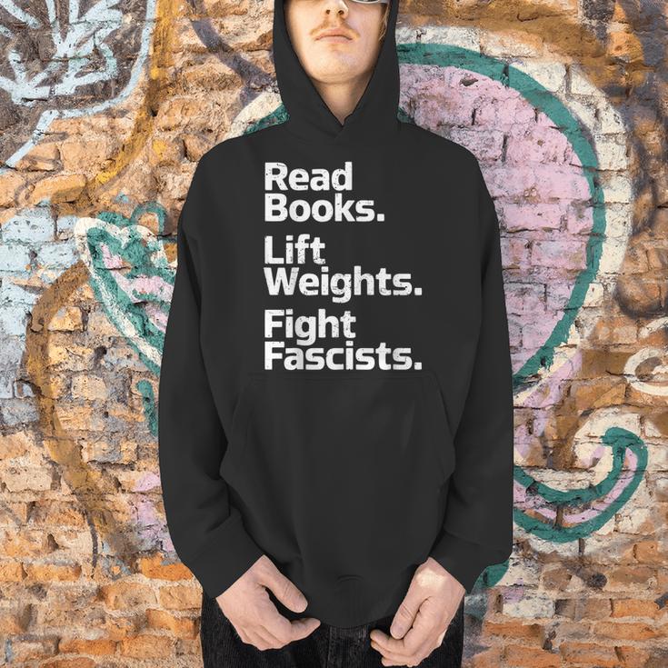 Read Books Lift Weights Fight Fascists Bookish Quote Men Hoodie Read Books Lift Weights Fight Fascists Bookish Quote Men Hoodie