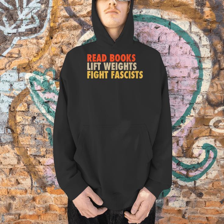 Read Books Lift Weights Fight Fascists Reading Humor Men Hoodie Read Books Lift Weights Fight Fascists Reading Humor Men Hoodie