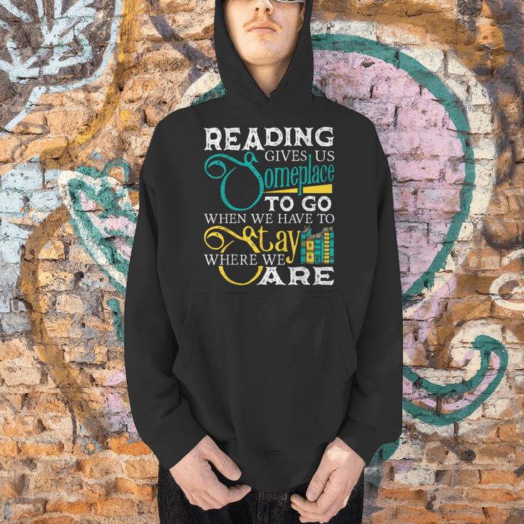 Reading Gives Us Someplace To Go Book Lover Teacher Bookworm Men Women Kids Men Hoodie Reading Gives Us Someplace To Go Book Lover Teacher Bookworm Men Women Kids Men Hoodie