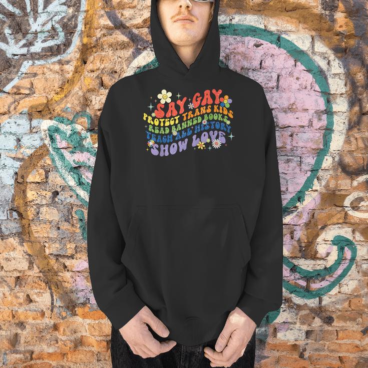 Say Gay Protect Trans Kids Banned Books Teach ALL History Men Hoodie Say Gay Protect Trans Kids Banned Books Teach ALL History Men Hoodie