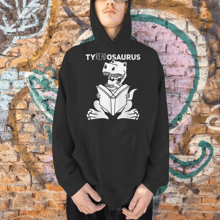 Teachersaurus Dinosaur Reading Book Reader Men Women Kids Men Hoodie