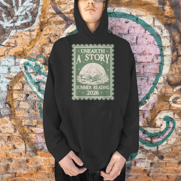 Unearth a Story Summer Reading 2026 Palaeontologists Book Men Hoodie Unearth a Story Summer Reading 2026 Palaeontologists Book Men Hoodie
