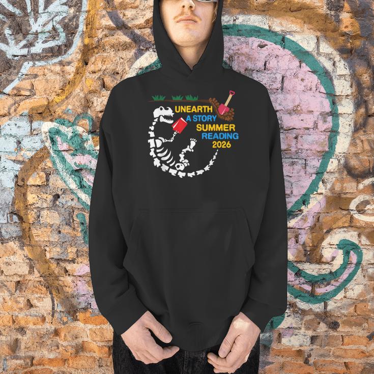 Unearth a Story T-Rex Reading a Book Summer Reading 2026 Men Hoodie Unearth a Story T-Rex Reading a Book Summer Reading 2026 Men Hoodie