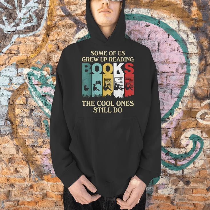Some Of Us Grew Up Reading Books The Cool Ones Still Do Men Hoodie