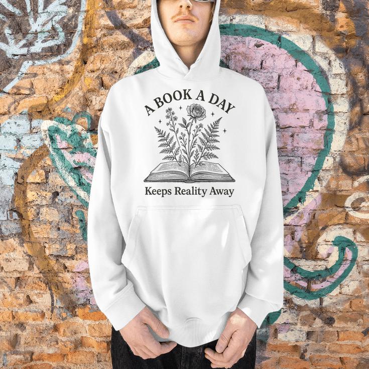 A Book A Day Keeps Reality Away Floral Reader Men Hoodie A Book A Day Keeps Reality Away Floral Reader Men Hoodie