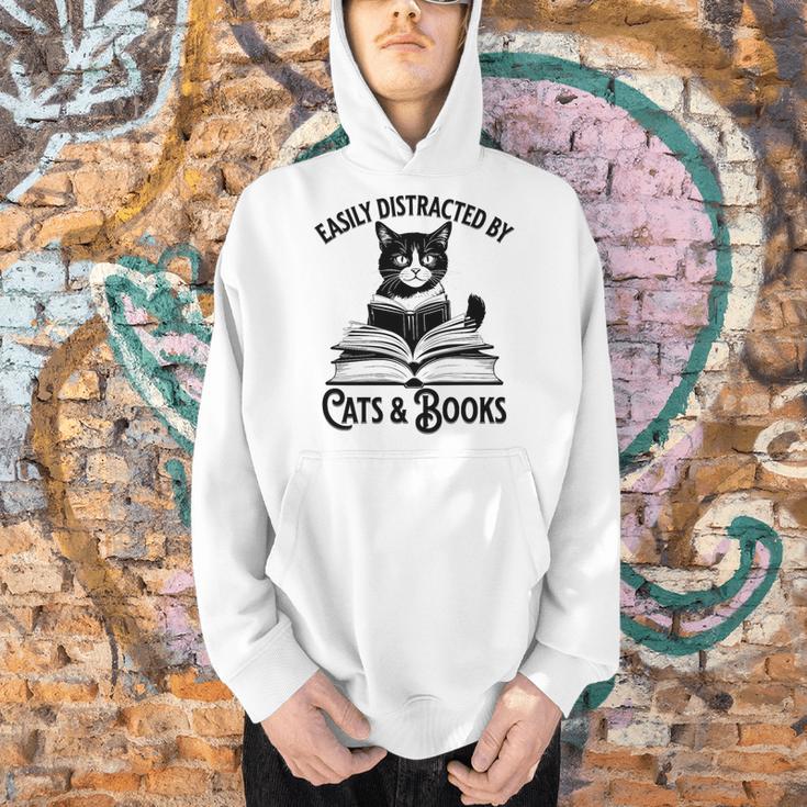 Easily Distracted By Cats And Books Book And Cat Lover Premium Tri-Blend Men Hoodie