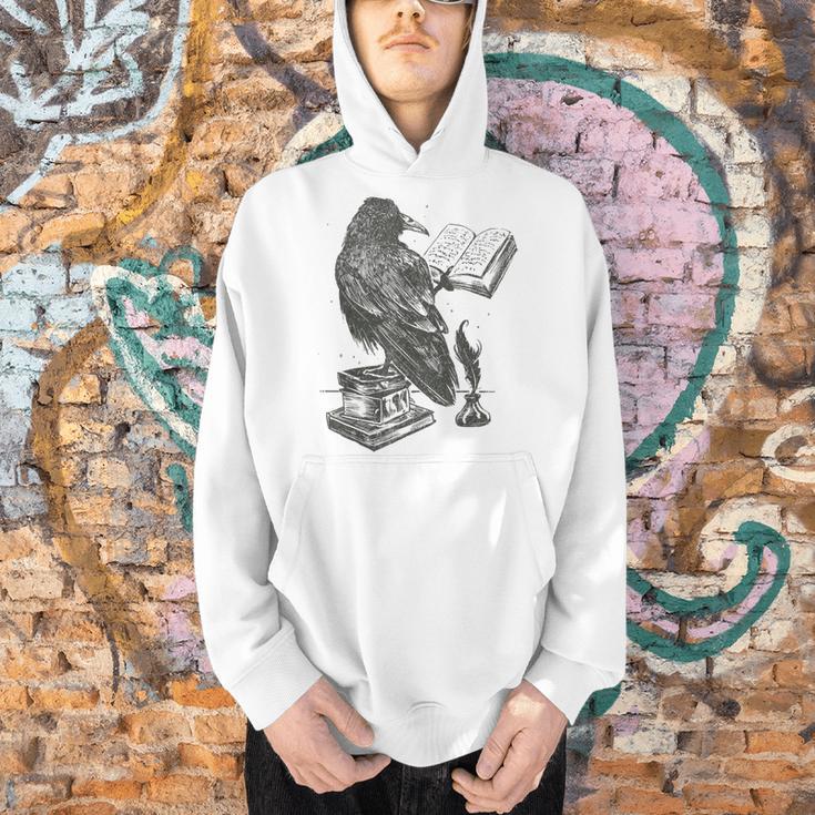 Raven Crow Reading a Magic Book Wizard Animal Bird Reader Men Hoodie