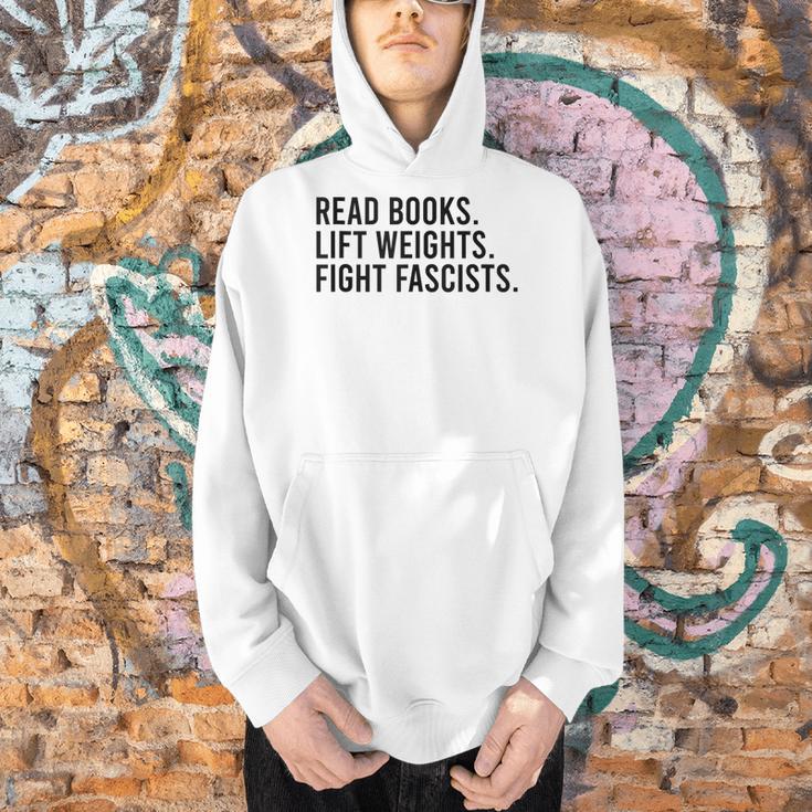 Read Books Lift Weights Fight Fascists Reading Activism Men Hoodie