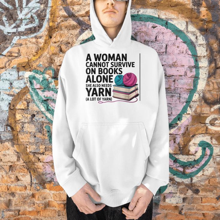 A Woman Cannot Survive On Books Alone She Also Needs Yarn Men Hoodie