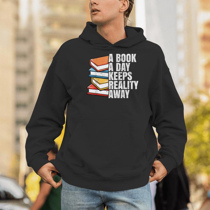 A Book A Day Keeps Reality Away Bookworm Men Hoodie A Book A Day Keeps Reality Away Bookworm Men Hoodie
