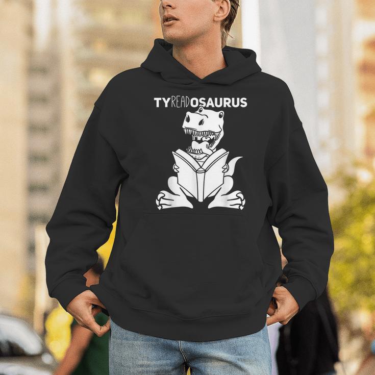Teachersaurus Dinosaur Reading Book Reader Men Women Kids Men Hoodie