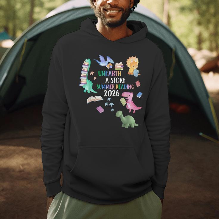Unearth a Story Dinosaur Book 2026 Summer Reading Program Men Hoodie Unearth a Story Dinosaur Book 2026 Summer Reading Program Men Hoodie