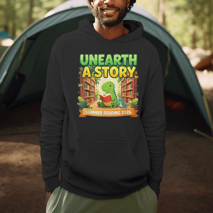 Unearth A Story Dinosaur Summer Reading 2026 Books Men Hoodie Unearth A Story Dinosaur Summer Reading 2026 Books Men Hoodie