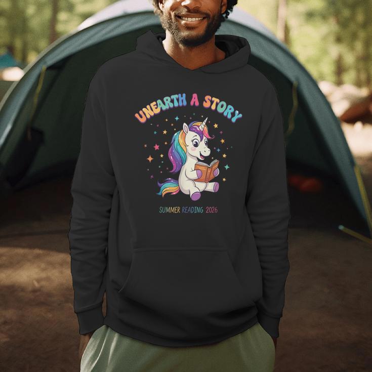 Unicorn Reading a Book Unearth a Story Program 2026 Men Hoodie
