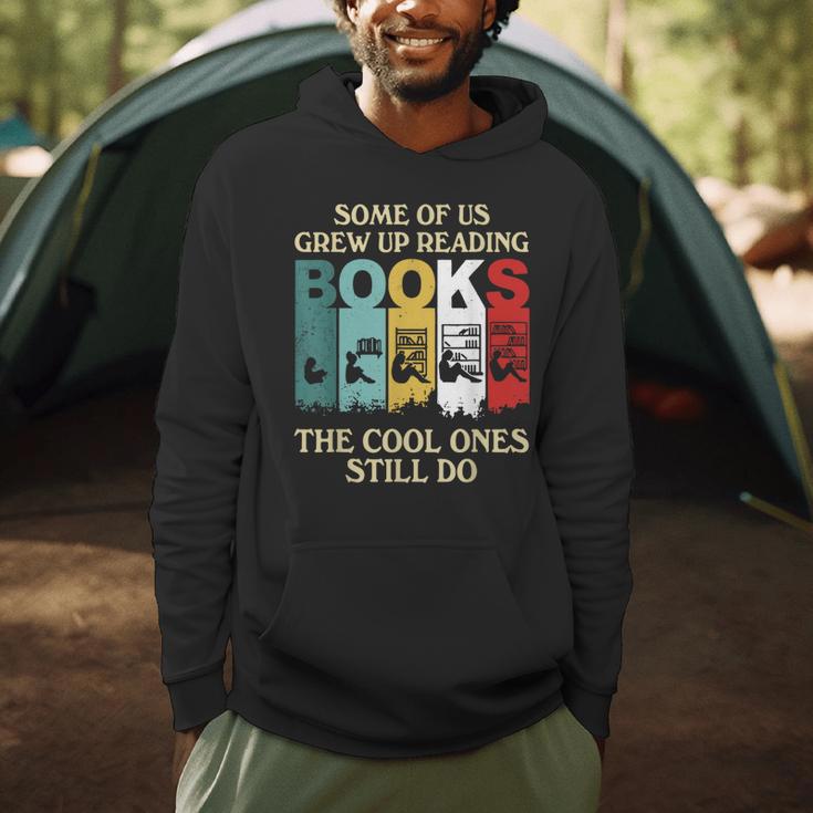 Some Of Us Grew Up Reading Books The Cool Ones Still Do Men Hoodie