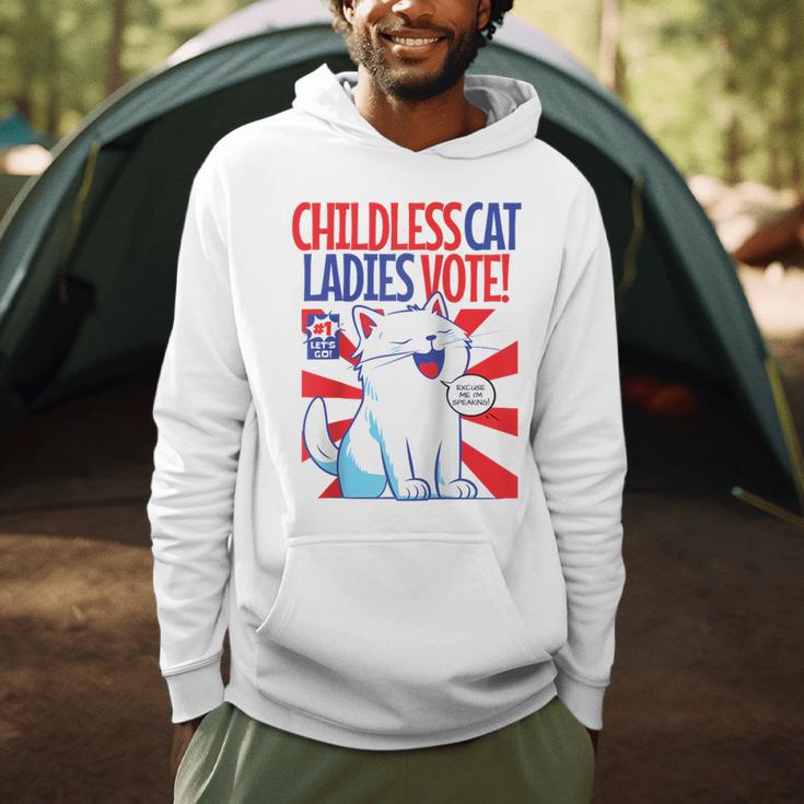 Childless Cat Ladies Vote Kamala Harris Cute Comic Book Cat Raglan Baseball Tee Men Hoodie Childless Cat Ladies Vote Kamala Harris Cute Comic Book Cat Raglan Baseball Tee Men Hoodie