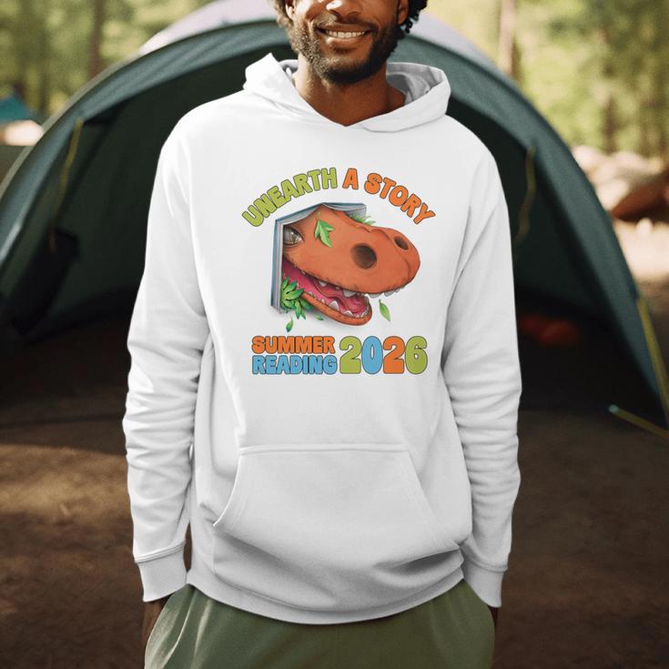 Unearth A Story Summer Reading 2026 Dinosaur Book Lover Dino Premium Tri-Blend Men Hoodie Unearth A Story Summer Reading 2026 Dinosaur Book Lover Dino Premium Tri-Blend Men Hoodie