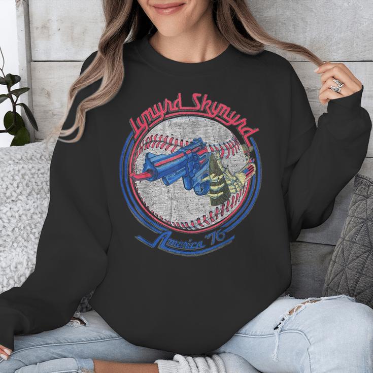 Lynyrd Skynyrd Skeleton Baseball Gun US Flag Cowboy Rock Fan Unisex Sweatshirt Lynyrd Skynyrd Skeleton Baseball Gun US Flag Cowboy Rock Fan Unisex Sweatshirt