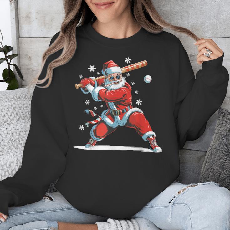 Santa Playing Baseball Christmas Candy Cane Fun Xmas Holiday Unisex Sweatshirt Santa Playing Baseball Christmas Candy Cane Fun Xmas Holiday Unisex Sweatshirt