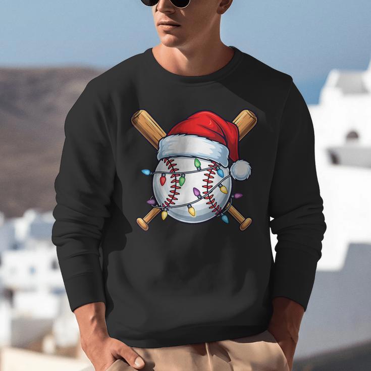 Baseball Christmas Lights Santa Christmas Baseball Player Unisex Sweatshirt Baseball Christmas Lights Santa Christmas Baseball Player Unisex Sweatshirt