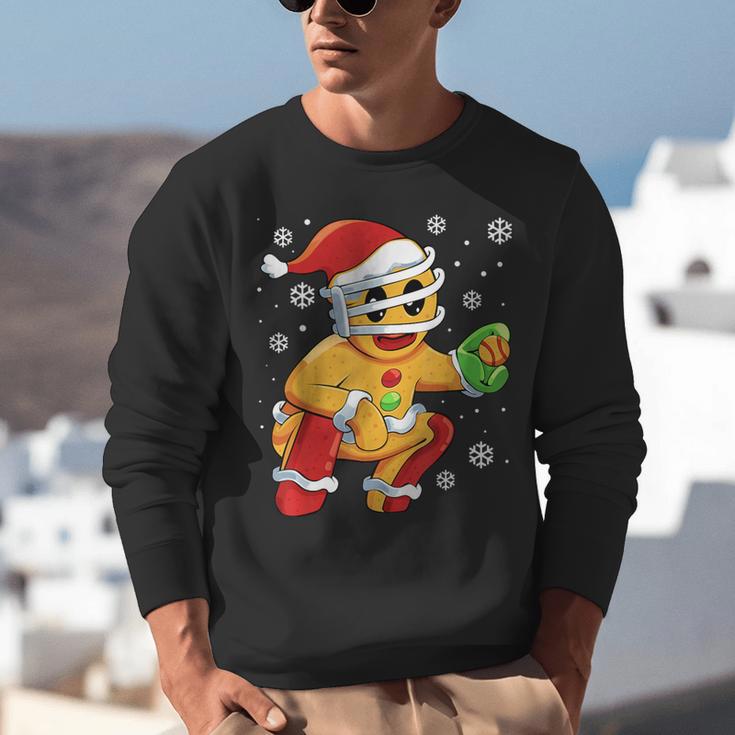 Christmas Gingerbread Man Baseball Player Catcher Unisex Sweatshirt Christmas Gingerbread Man Baseball Player Catcher Unisex Sweatshirt
