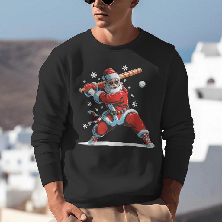 Santa Playing Baseball Christmas Candy Cane Fun Xmas Holiday Unisex Sweatshirt Santa Playing Baseball Christmas Candy Cane Fun Xmas Holiday Unisex Sweatshirt