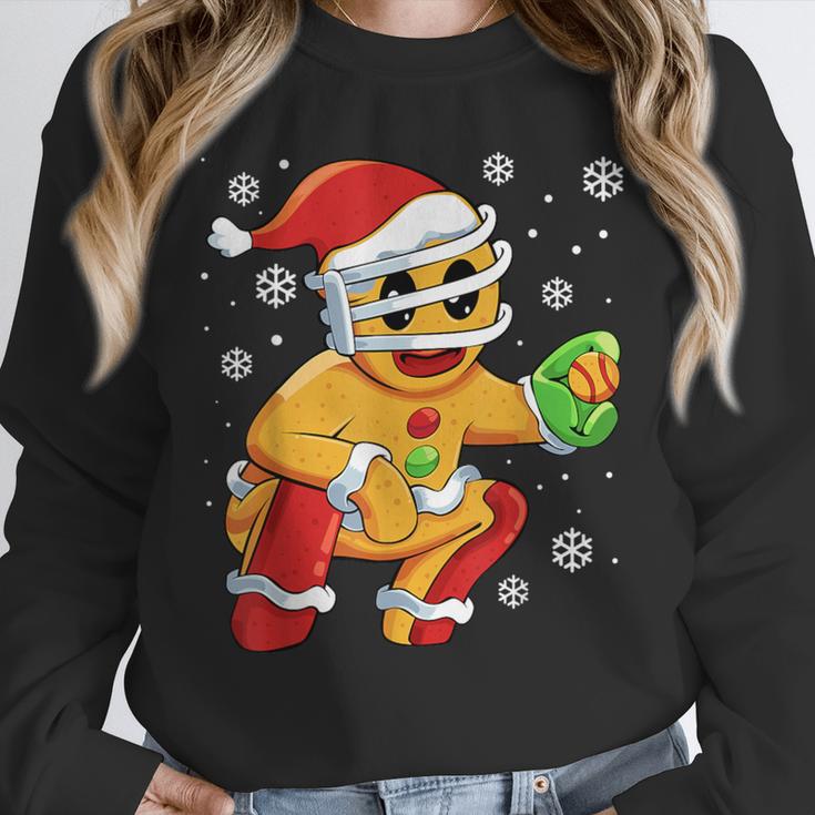 Christmas Gingerbread Man Baseball Player Catcher Unisex Sweatshirt Christmas Gingerbread Man Baseball Player Catcher Unisex Sweatshirt