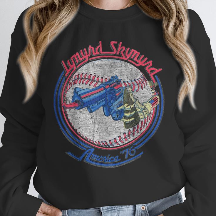Lynyrd Skynyrd Skeleton Baseball Gun US Flag Cowboy Rock Fan Unisex Sweatshirt Lynyrd Skynyrd Skeleton Baseball Gun US Flag Cowboy Rock Fan Unisex Sweatshirt