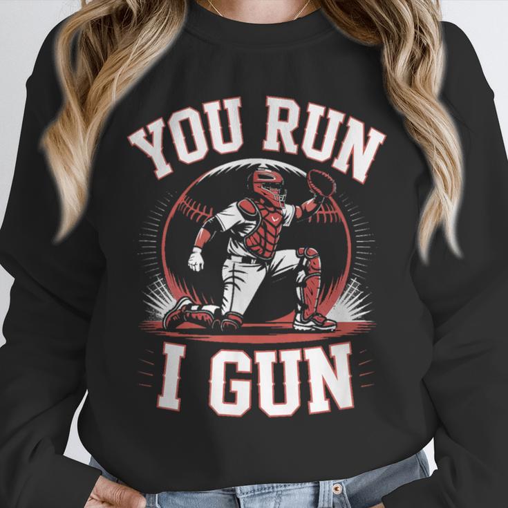 You Run I Gun Baseball Catcher Softball Player Unisex Sweatshirt You Run I Gun Baseball Catcher Softball Player Unisex Sweatshirt