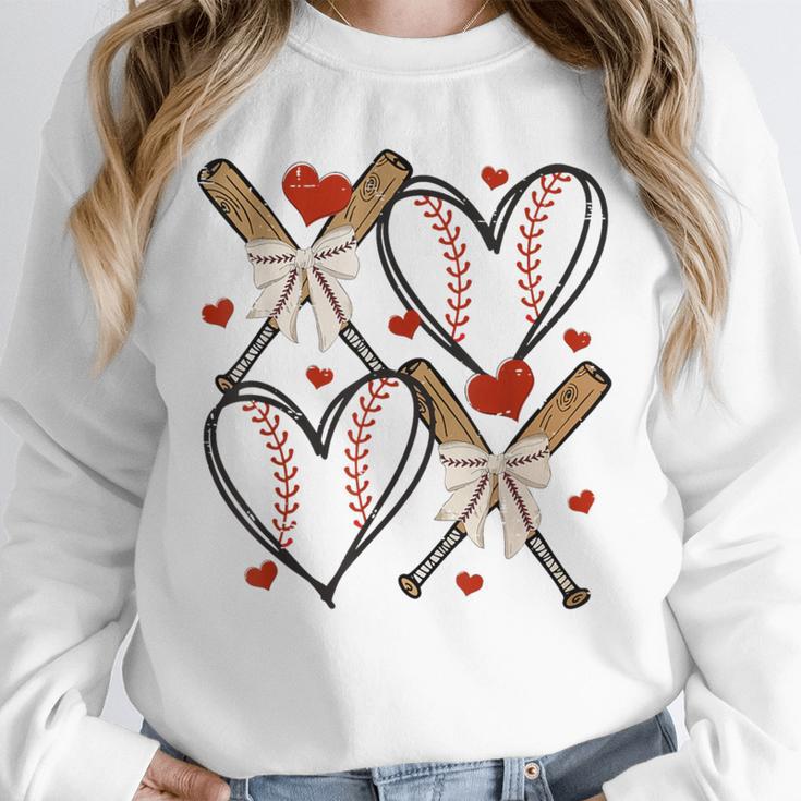 Coquette Bow XOXO Baseball Lover Heart Valentine Game Day Unisex Sweatshirt Coquette Bow XOXO Baseball Lover Heart Valentine Game Day Unisex Sweatshirt