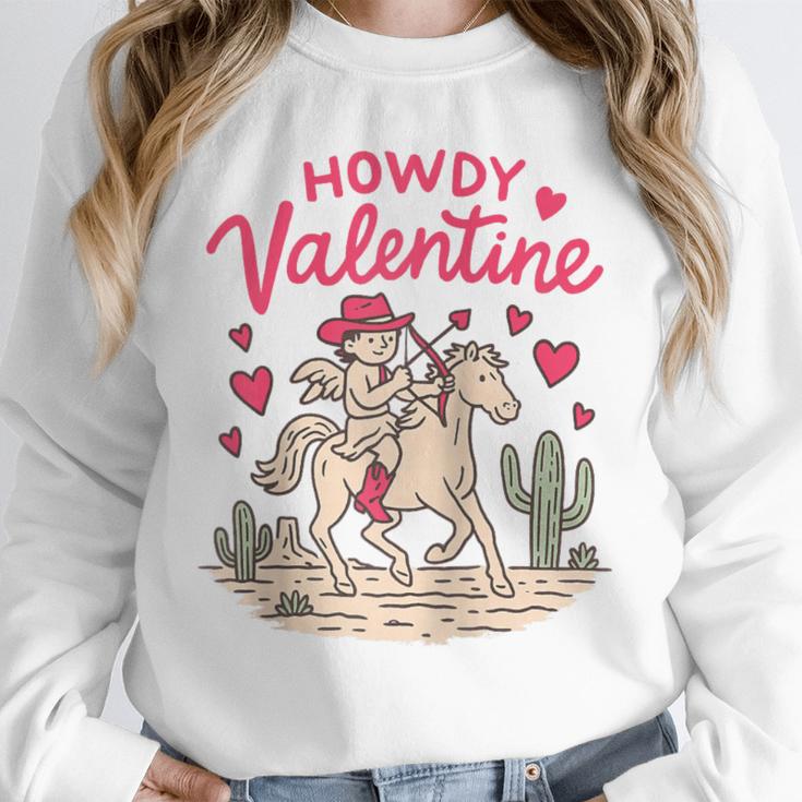 Valentine’s Day Western Life Cowboys Cupid Howdy Valentine Raglan Baseball Tee Unisex Sweatshirt Valentine’s Day Western Life Cowboys Cupid Howdy Valentine Raglan Baseball Tee Unisex Sweatshirt