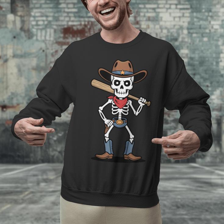 Cowboy Skeleton Baseball Halloween Graphic Unisex Sweatshirt Cowboy Skeleton Baseball Halloween Graphic Unisex Sweatshirt