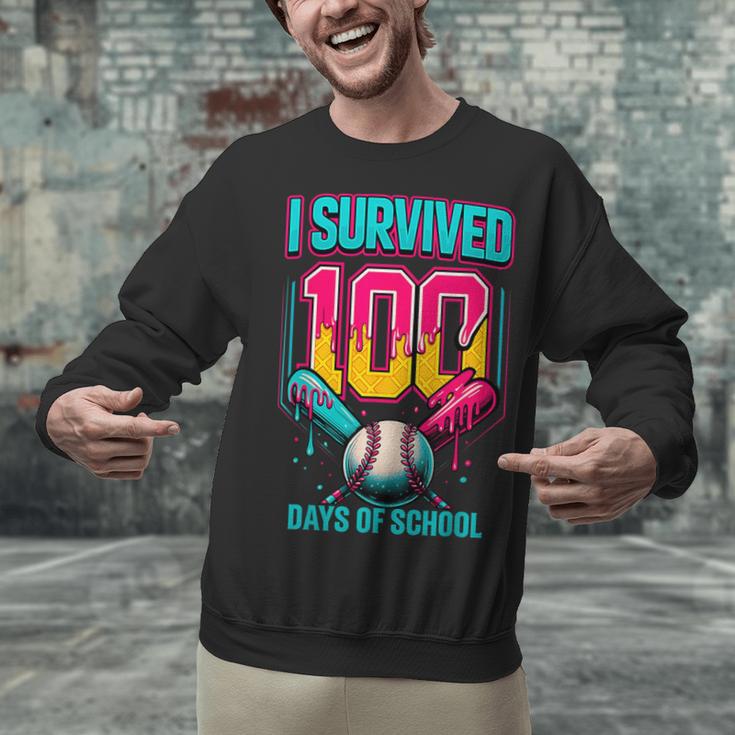 HUGvyn I Survived 100 Days Baseball Teacher Ice Cream Drip Unisex Sweatshirt HUGvyn I Survived 100 Days Baseball Teacher Ice Cream Drip Unisex Sweatshirt