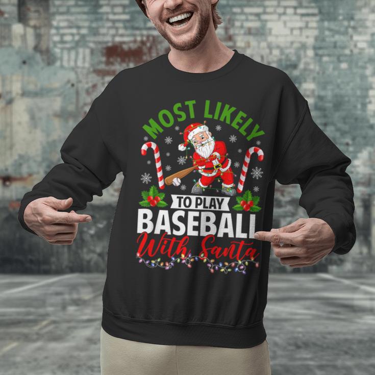 Most Likely To Play Baseball With Santa Christmas Pajamas Unisex Sweatshirt