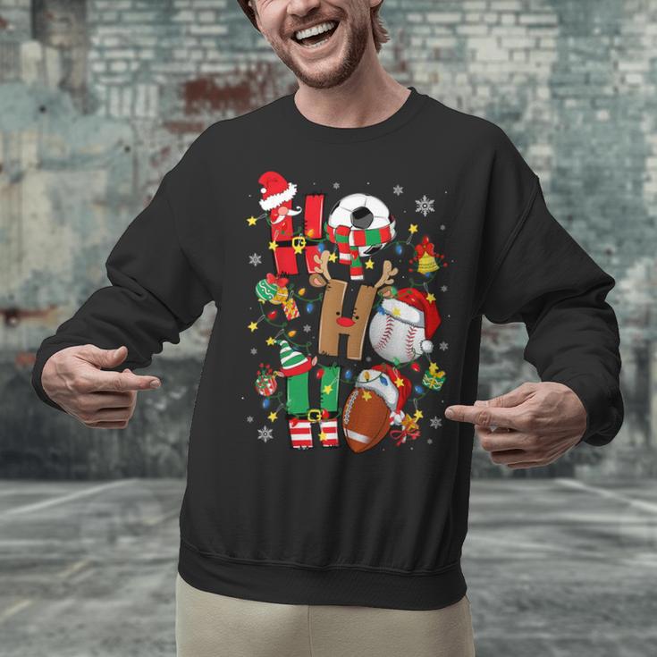Santa Baseball Football Soccer Pajamas Ho Ho Christmas Xmas Unisex Sweatshirt Santa Baseball Football Soccer Pajamas Ho Ho Christmas Xmas Unisex Sweatshirt