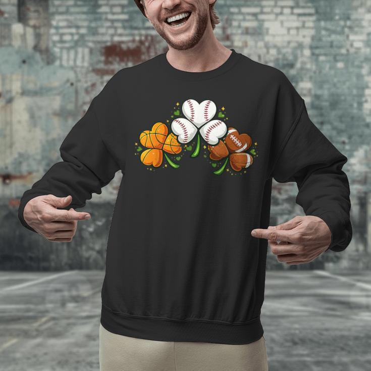 Shamrock Baseball Basketball Football St Patricks Day Unisex Sweatshirt Shamrock Baseball Basketball Football St Patricks Day Unisex Sweatshirt