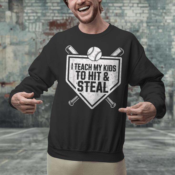 I Teach My Kids To Hit & Steal Baseball Player Coach Dad Tee Unisex Sweatshirt