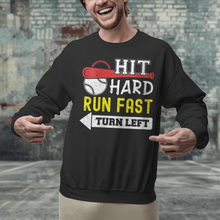 Women's Hit Hard Run Fast Turn Left Baseball Quote Fan Coach Unisex Sweatshirt