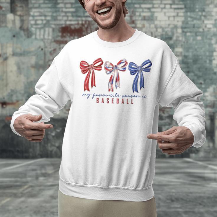My Favorite Season Is Baseball Coquette Bow Game Day Mom Sis Unisex Sweatshirt My Favorite Season Is Baseball Coquette Bow Game Day Mom Sis Unisex Sweatshirt