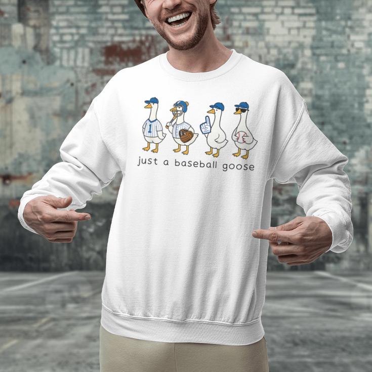 Just a Baseball GooseLife Is Better With Geese On Your Team Unisex Sweatshirt