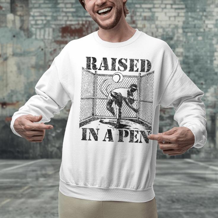 Raised In a Pen Baseball Pitcher Saying Bullpen Unisex Sweatshirt