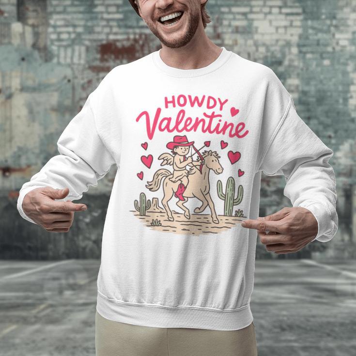 Valentine’s Day Western Life Cowboys Cupid Howdy Valentine Raglan Baseball Tee Unisex Sweatshirt Valentine’s Day Western Life Cowboys Cupid Howdy Valentine Raglan Baseball Tee Unisex Sweatshirt